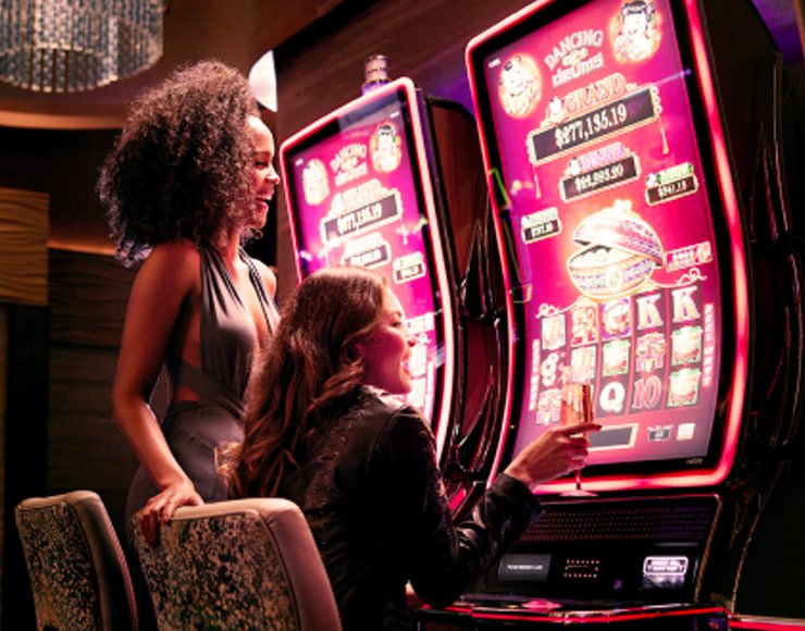 NetEnt live blackjack table on mobile phone showing dealer and betting interface